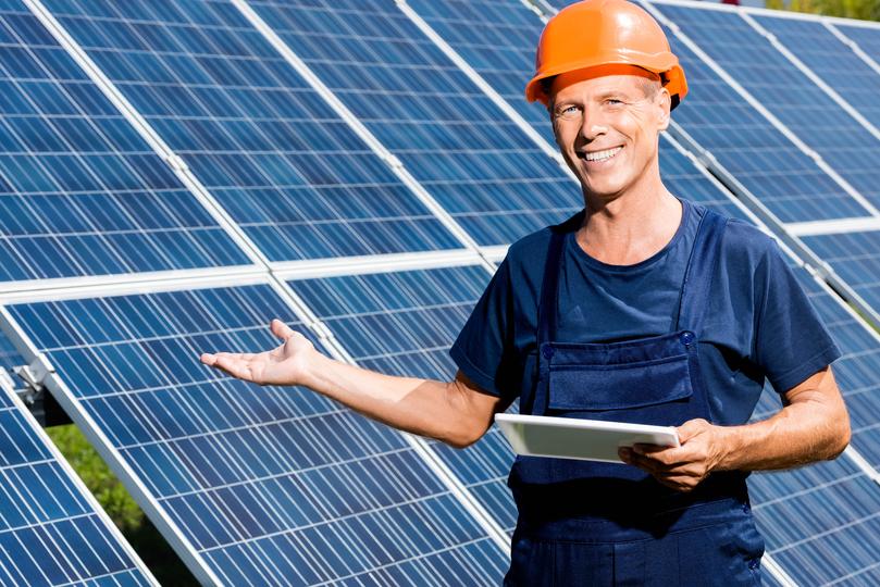 Solar panels installed on the roof of a commercial building in UK